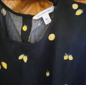 Sleeveless lemon blouse size XL